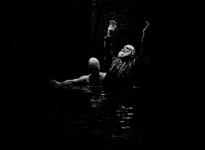 Archivo gif con una ilustración de un hombre con las manos arriba implorando, su cuerpo sumergido de la cintura para abajo en agua y acompañándole una figura humana sin rostro
